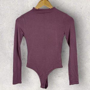 Naked Wardrobe Mauve Long Sleeve Mock Neck Snap Thong Bodysuit Size Small USA S